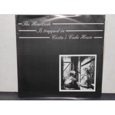 THE HEARTSIDE IS TRAPPED IN COSTA'S CAKE HOUSE - 7" GERMANY